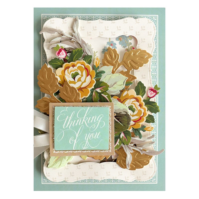 a greeting card with flowers on it.