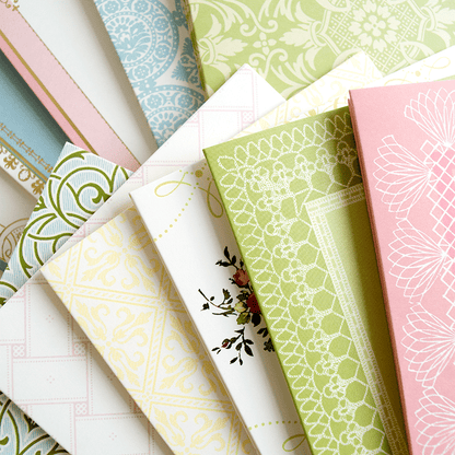 a close up of many different colored papers.