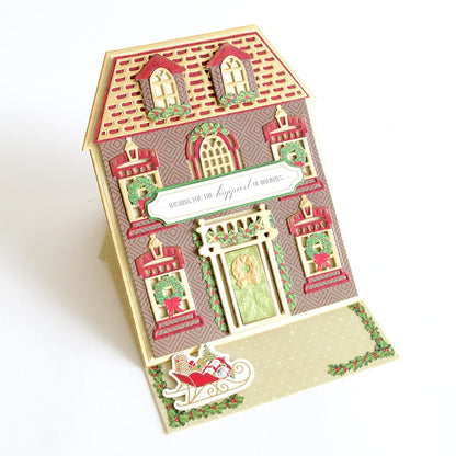 a card with a house on the front of it.