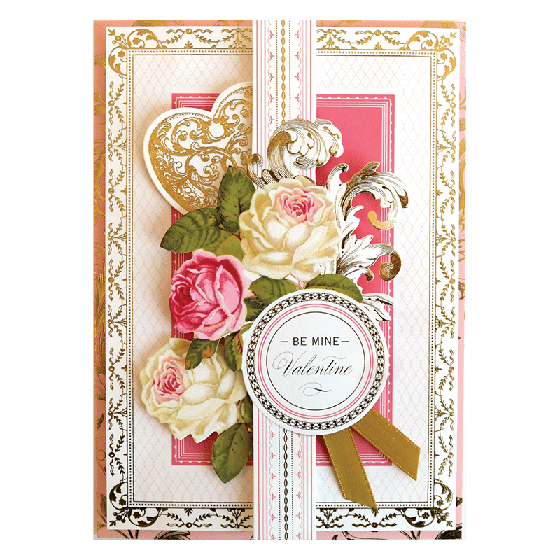 a card with roses and a heart on it.