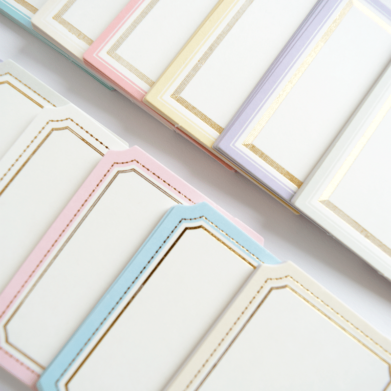 a close up of a group of cards on a table.
