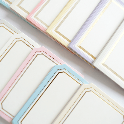 a close up of a group of cards on a table.
