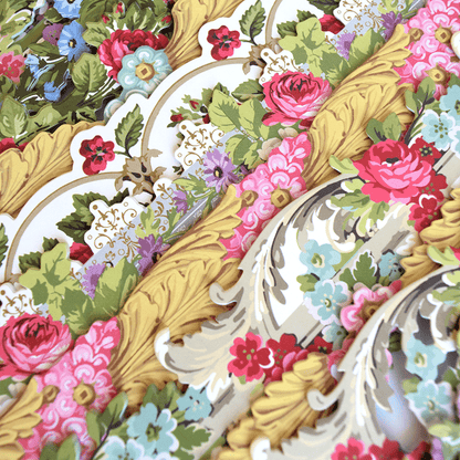 a close up of a flowered table cloth.