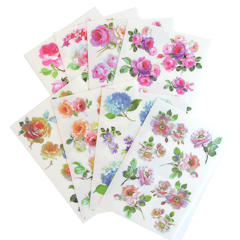 a bunch of cards with flowers on them.