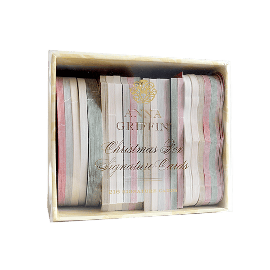 a wooden box filled with different colored ribbons.
