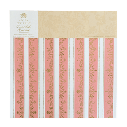 a pink and white striped paper with gold trim.