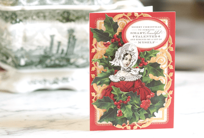 a christmas card with a picture of a woman on it.