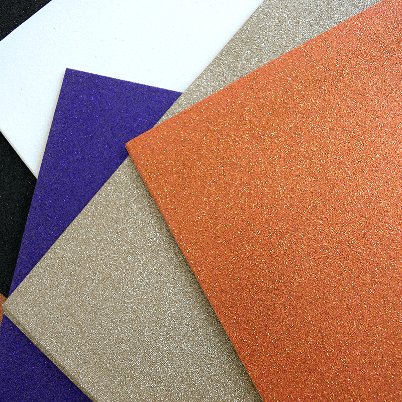 a close up of a variety of different colors of paper.