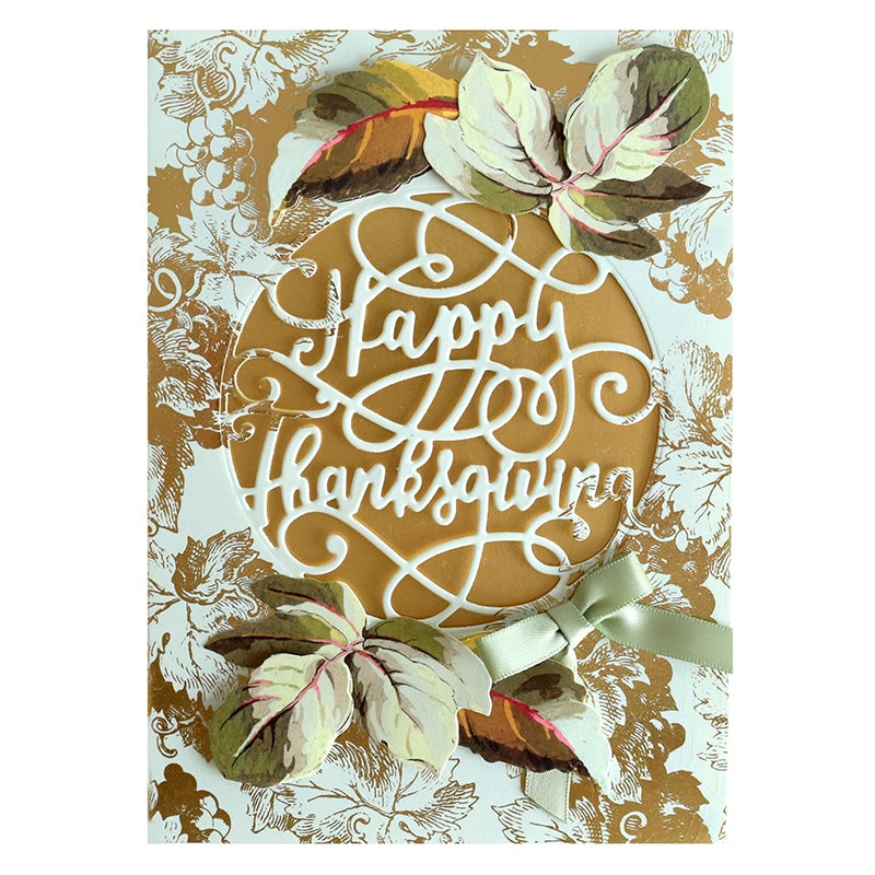 a happy thanksgiving card with a cookie decorated with leaves.