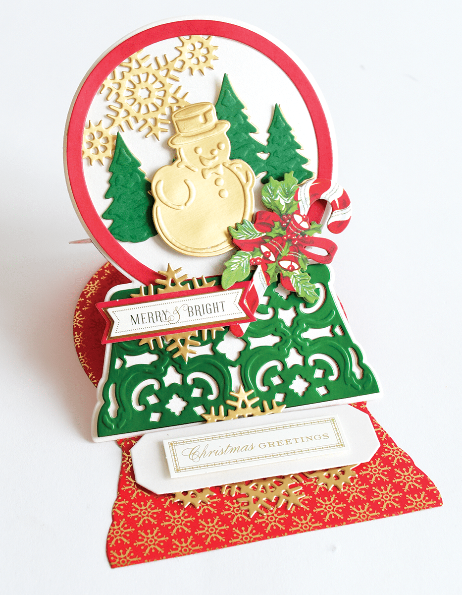 a close up of a christmas card with a snowman.