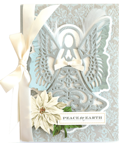 a card with a white flower and a white ribbon.