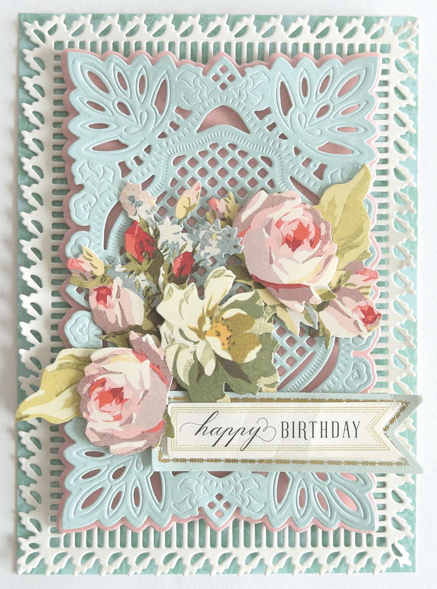 a birthday card with flowers on it.