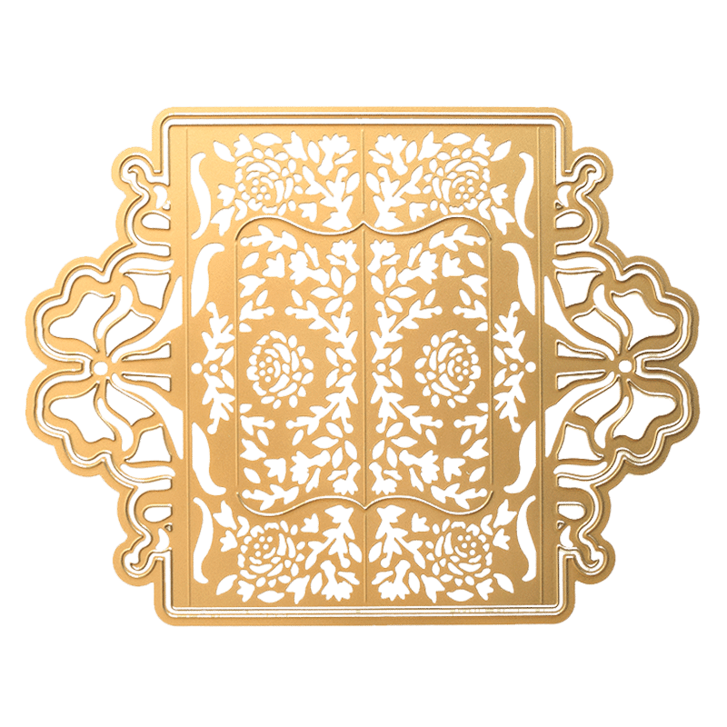 a gold plate with a floral design on it.