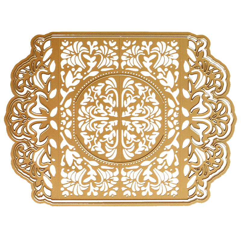 a gold plate with a decorative design on it.