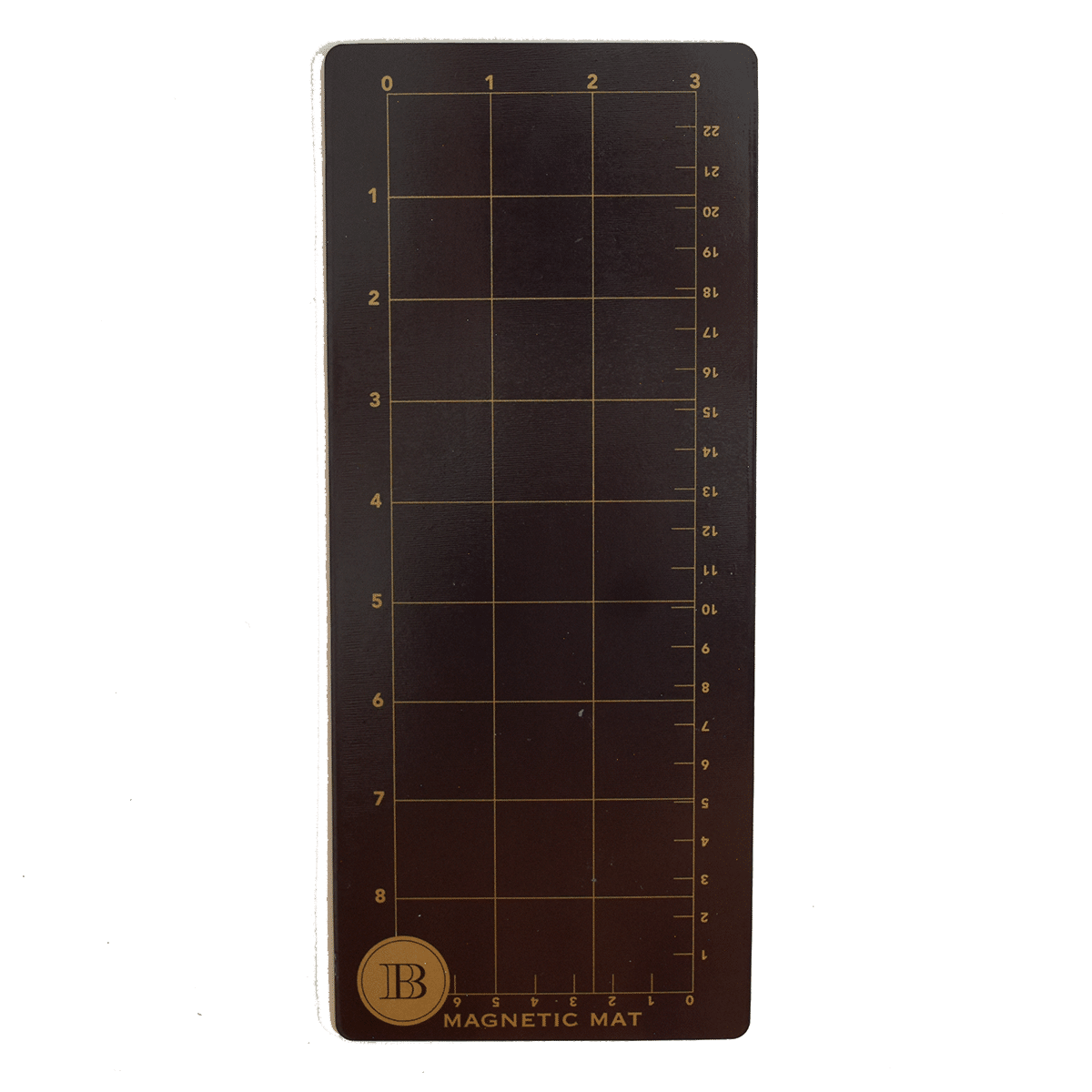 a brown magnetic mat with a ruler on it.