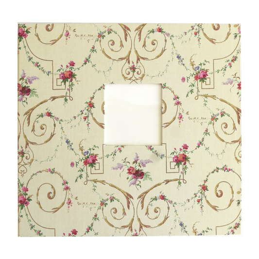 a picture frame with a floral pattern on it.