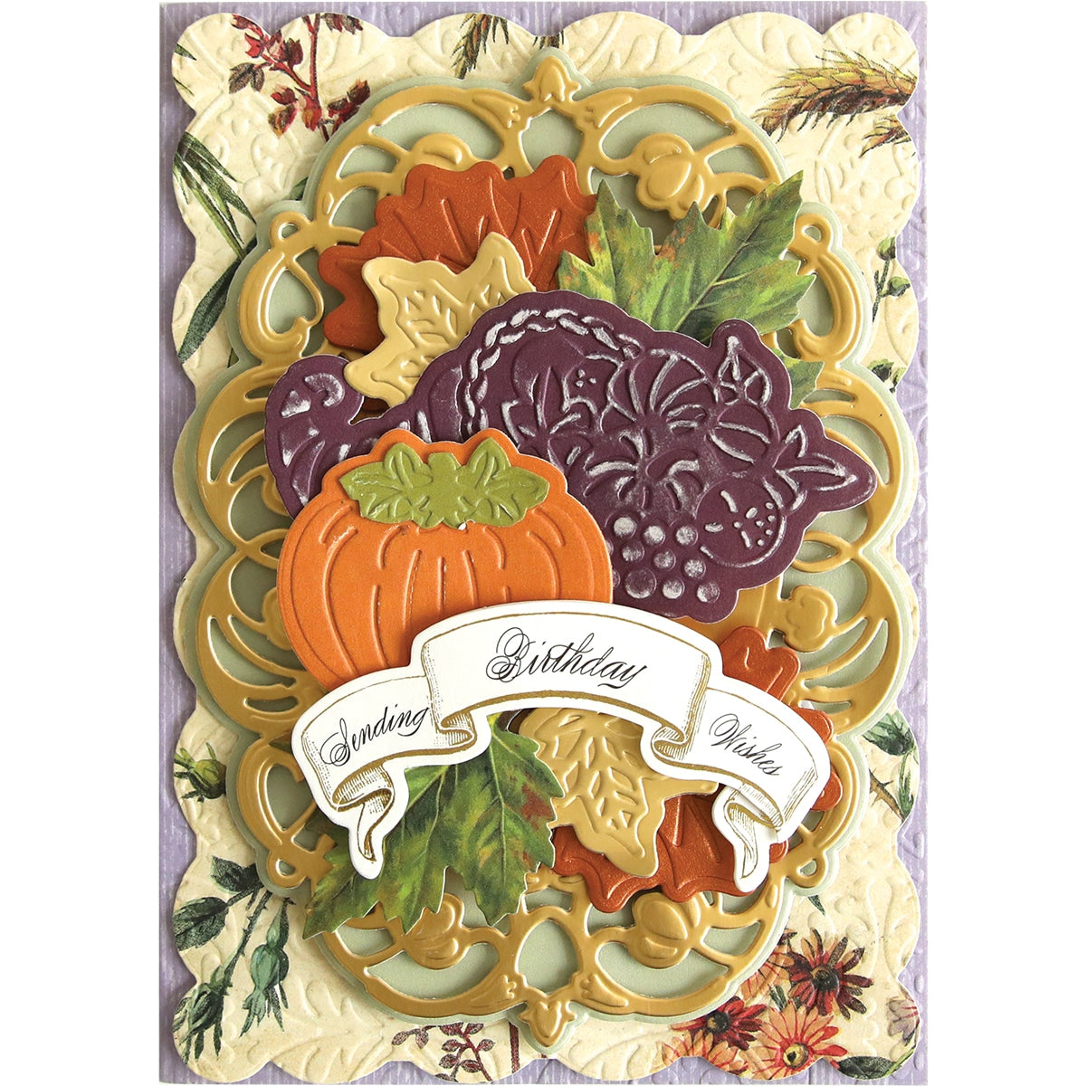 a card with a pumpkin, grapes, and other vegetables.