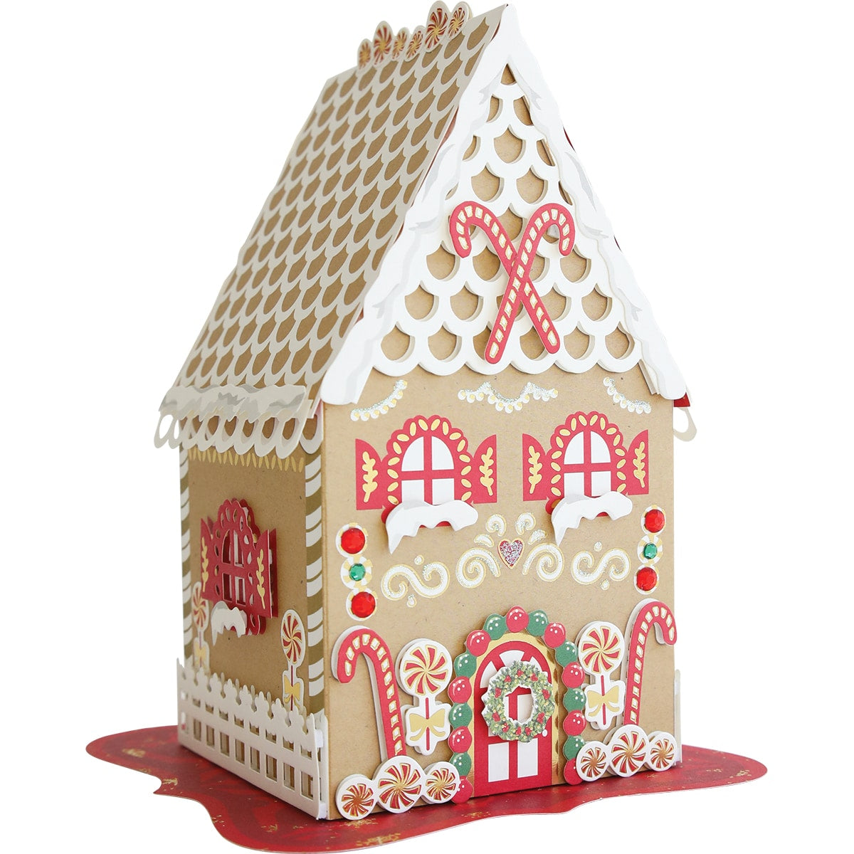 a gingerbread house is decorated with candy canes.