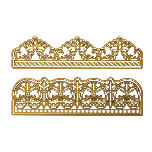 a pair of decorative gold trimmings on a green background.