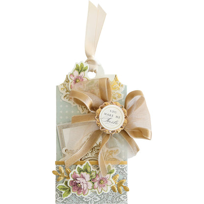 a gift box with a ribbon and a tag.