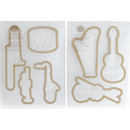a set of cookie cutters with musical instruments.