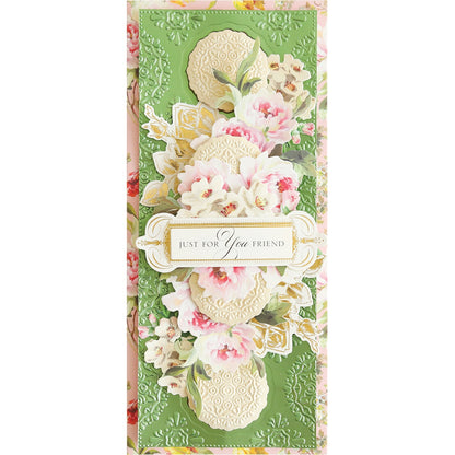 a greeting card with flowers on a green background.