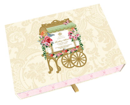 a wedding album with a floral design on it.