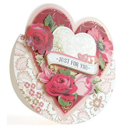 a heart shaped card with flowers on it.