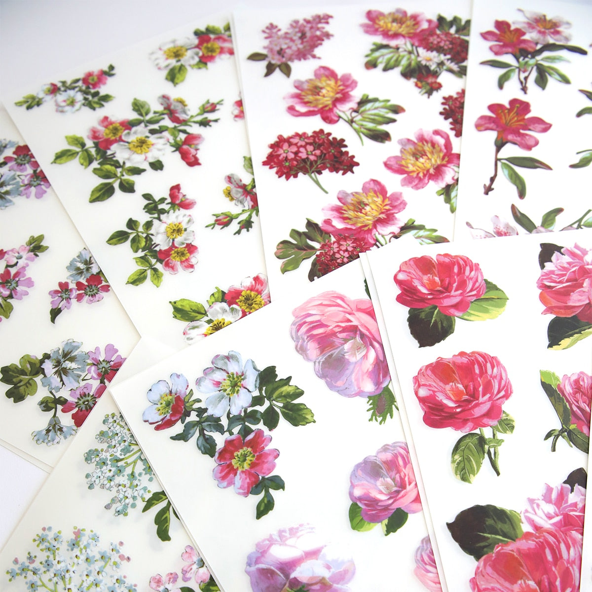 a bunch of cards with flowers on them.