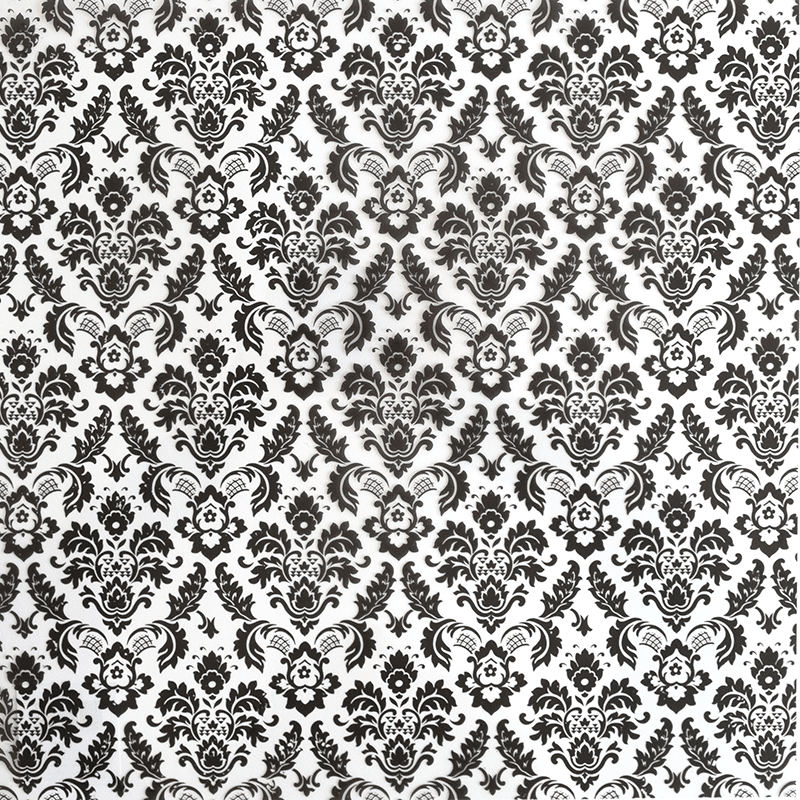 a black and white wallpaper with black and white designs.
