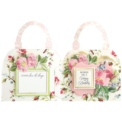 a couple of bags with flowers on them.