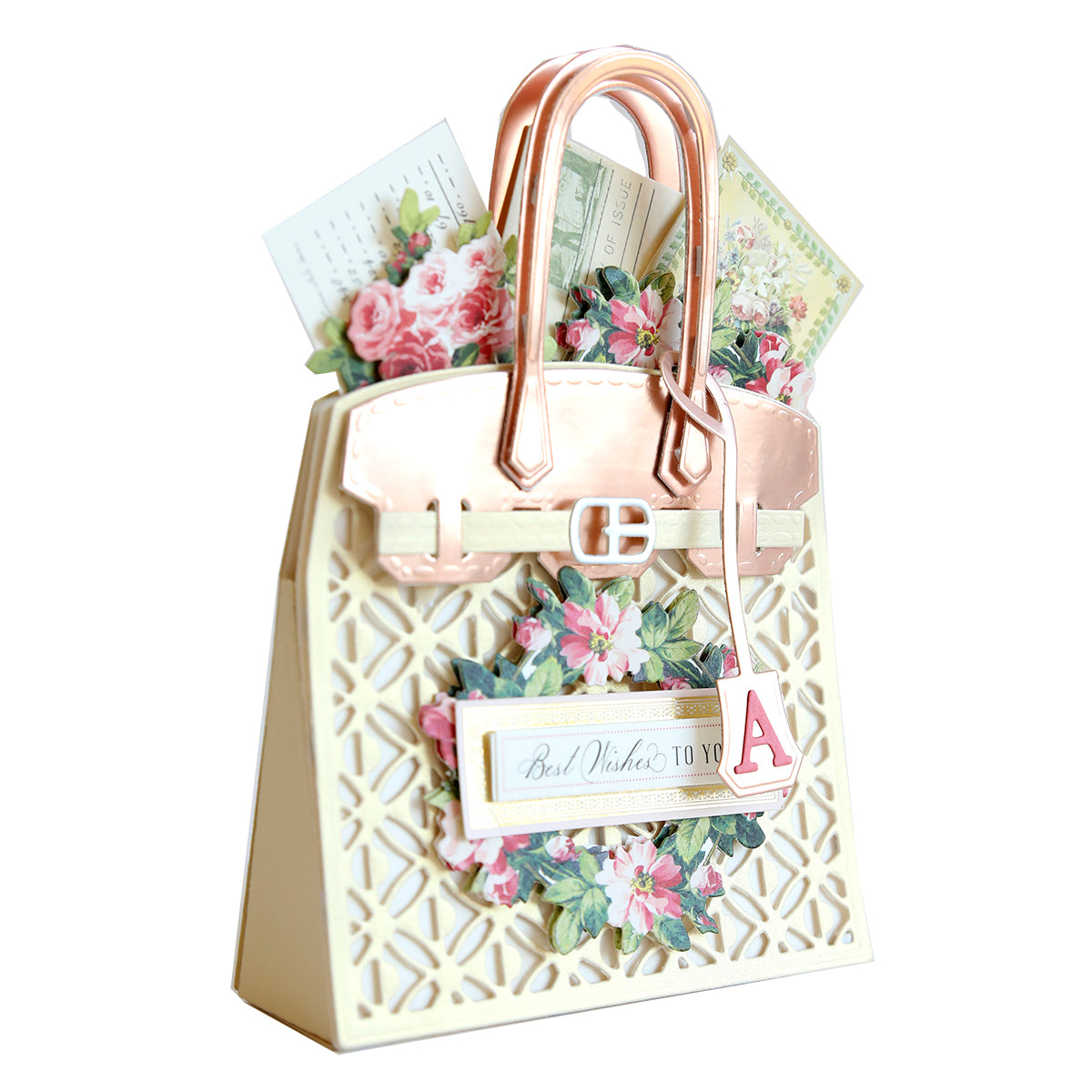 a white purse with pink flowers and a name tag.
