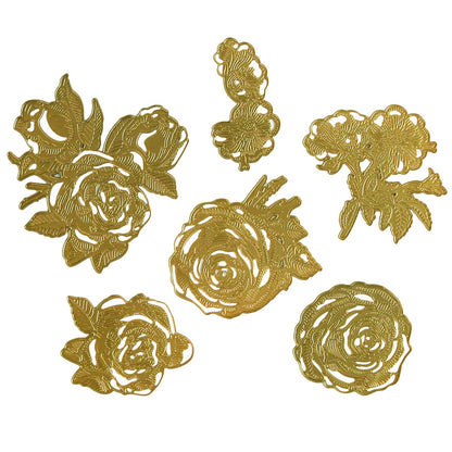 a bunch of gold colored flowers on a white background.