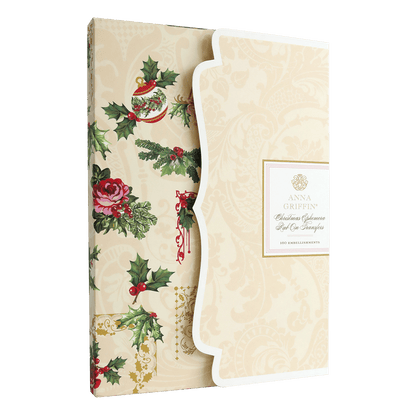 A beige Christmas Ephemera Rub Ons cover with holly leaves and holly berries.