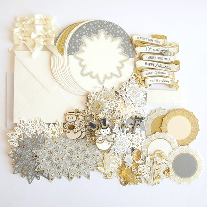 A collection of Simply Rocking Snowflake Card Kit scrapbooking supplies.