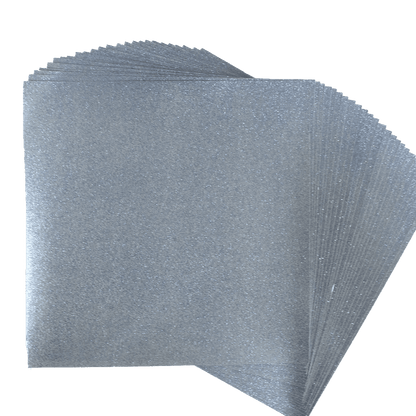 a stack of silver napkins on a white background.