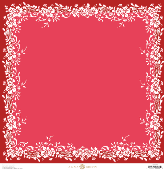 a red square with white flowers on it.