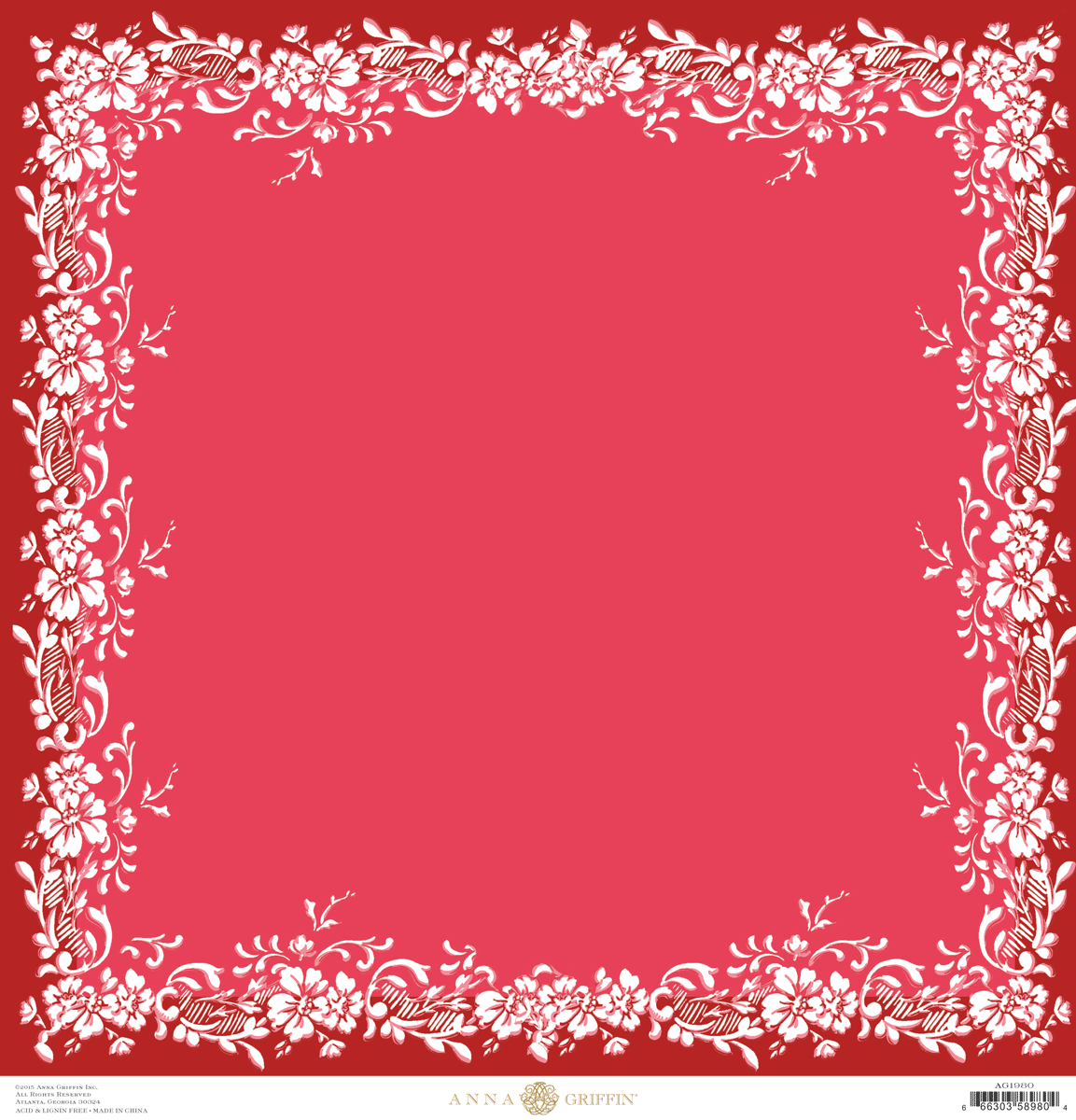 a red square with white flowers on it.