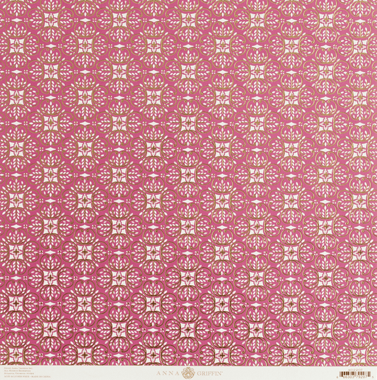 a pink and white wallpaper with a pattern on it.