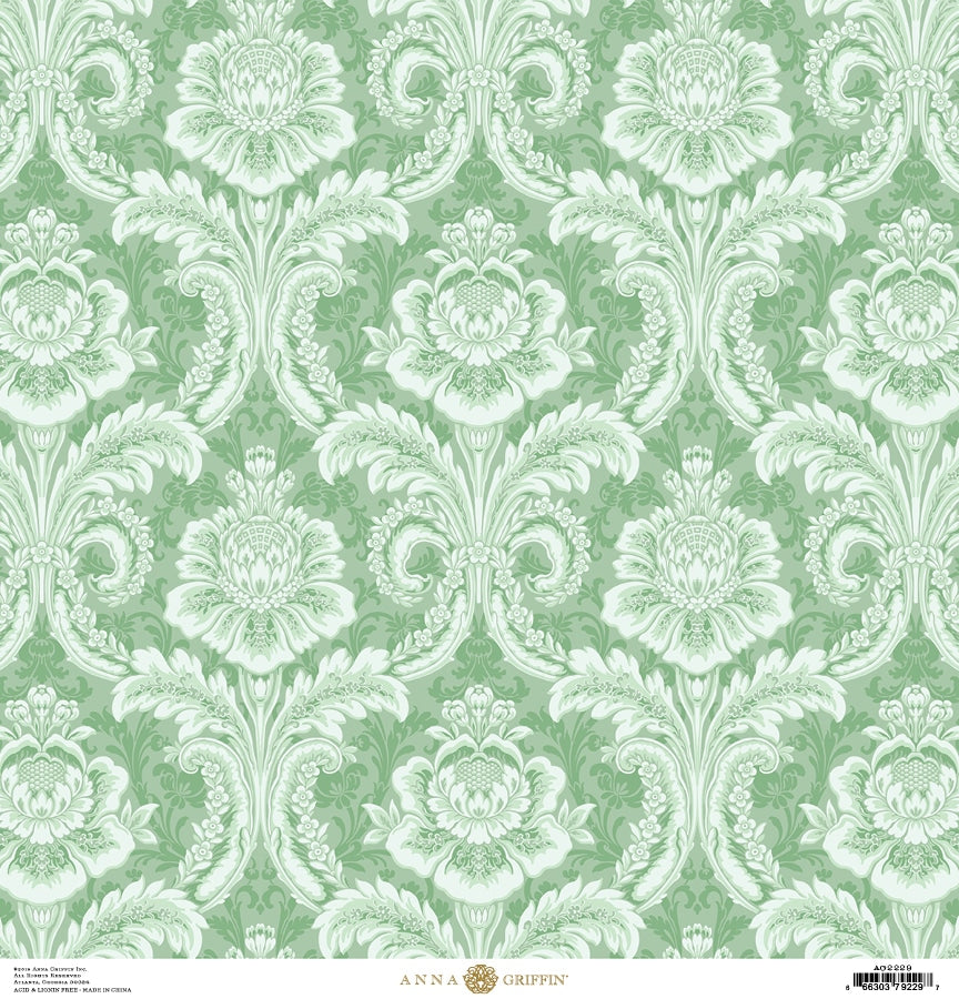 a green and white wallpaper with a floral design.