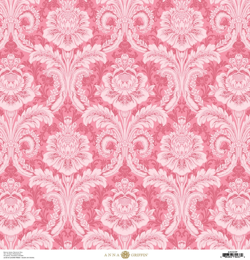 a pink wallpaper with a large flower pattern.
