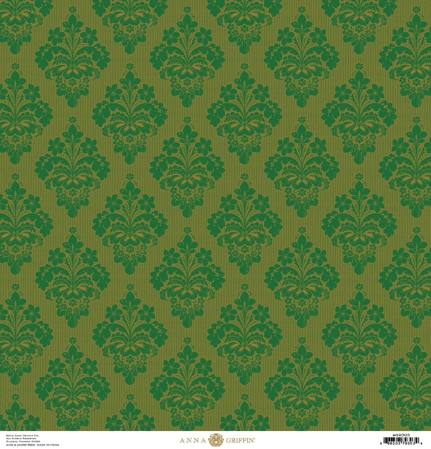 a green wallpaper with a floral design.