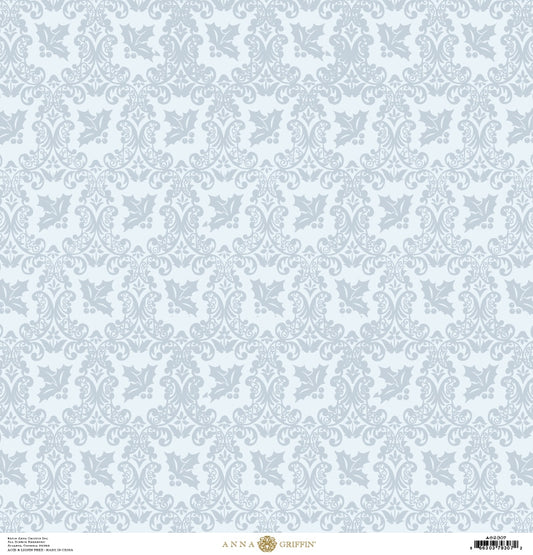 a blue and white wallpaper with a floral pattern.