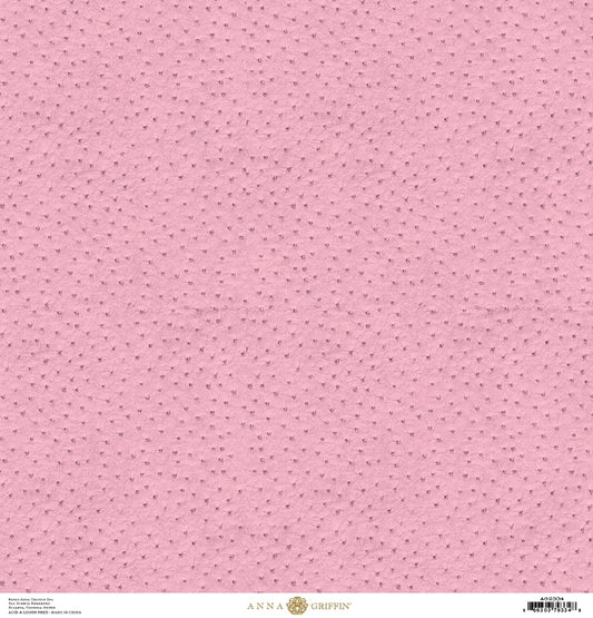 a pink background with small dots.
