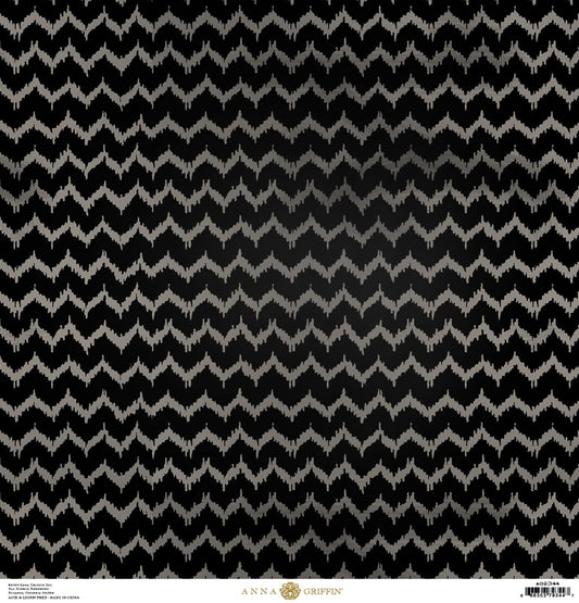 a black and white background with a zigzag pattern.
