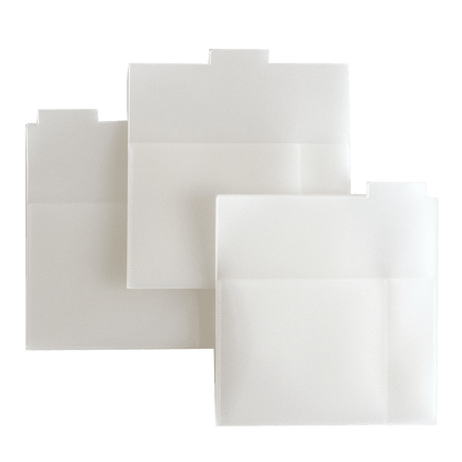 a set of three white envelopes sitting on top of each other.