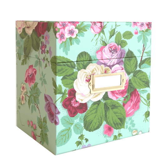a floral box with a name tag on it.