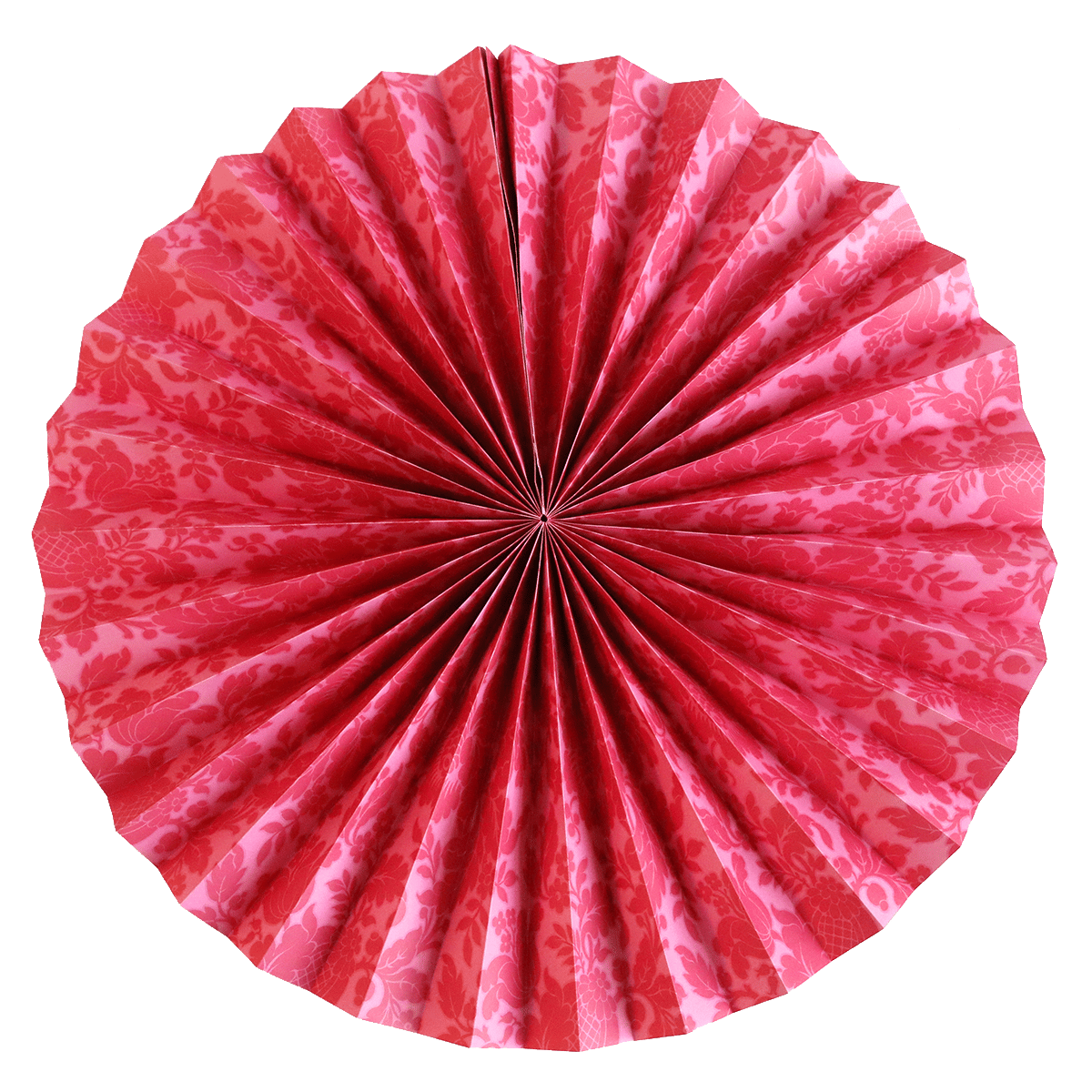 a close up of a paper fan on a green background.