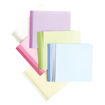 a pile of assorted colored papers on a white background.