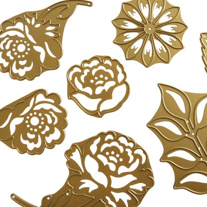 a bunch of gold flowers on a white background.